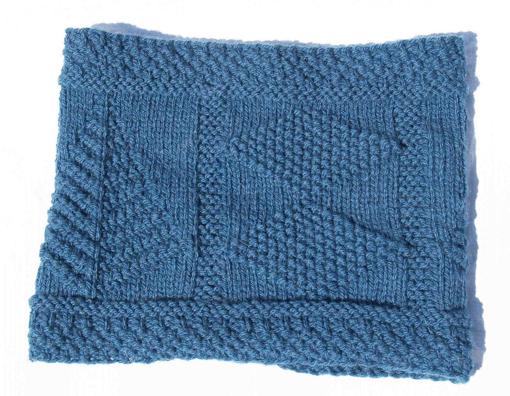Samantha Cowl knitting kit designed by Deborah Newton and introduced in partnership with the Seamen's Church Institute (SCI) Kit